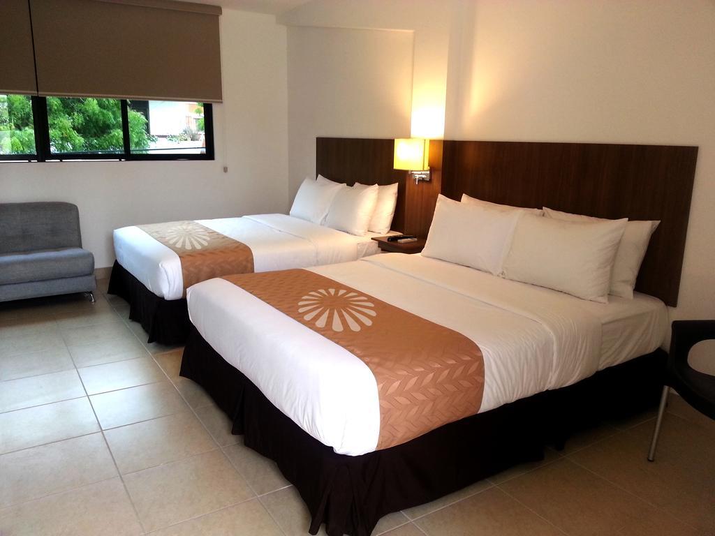 Buenavista Place Hotel Баия-де-Каракес Номер фото